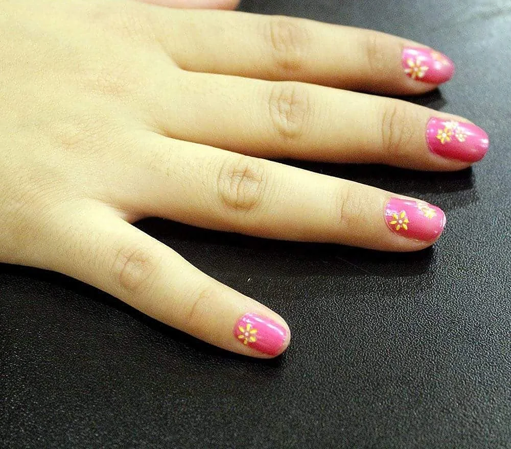 Pink nail art by Queens